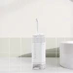 Mini IPX7 su geçirmez Ağız İrigatörü Ev Seyahat Su Diş İpi